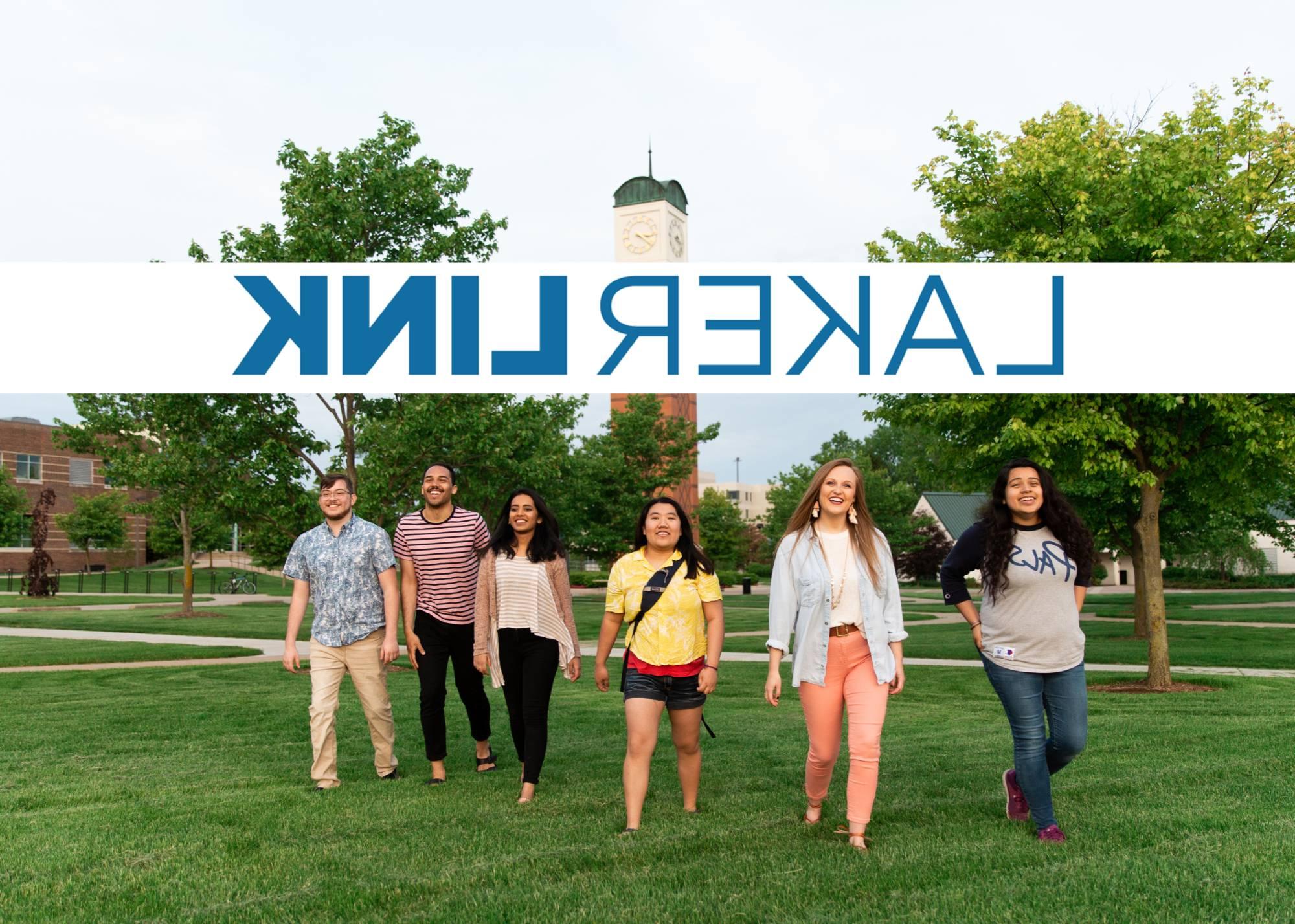 Students walking away from Cook Carillon-Tower with the words "LakerLink" above their heads.